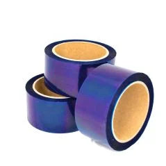 Three rolls of blue tape on a white background