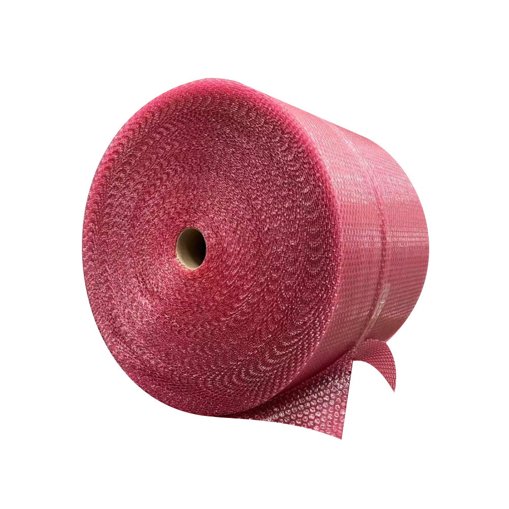 Pakio premium pink anti-static bubble wrap roll for protecting fragile gift hamper items during shipping.