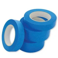 Three rolls of blue tape with white centers on a white background